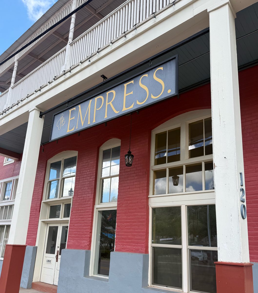 Entrance close-up — The Empress sign on the historic building